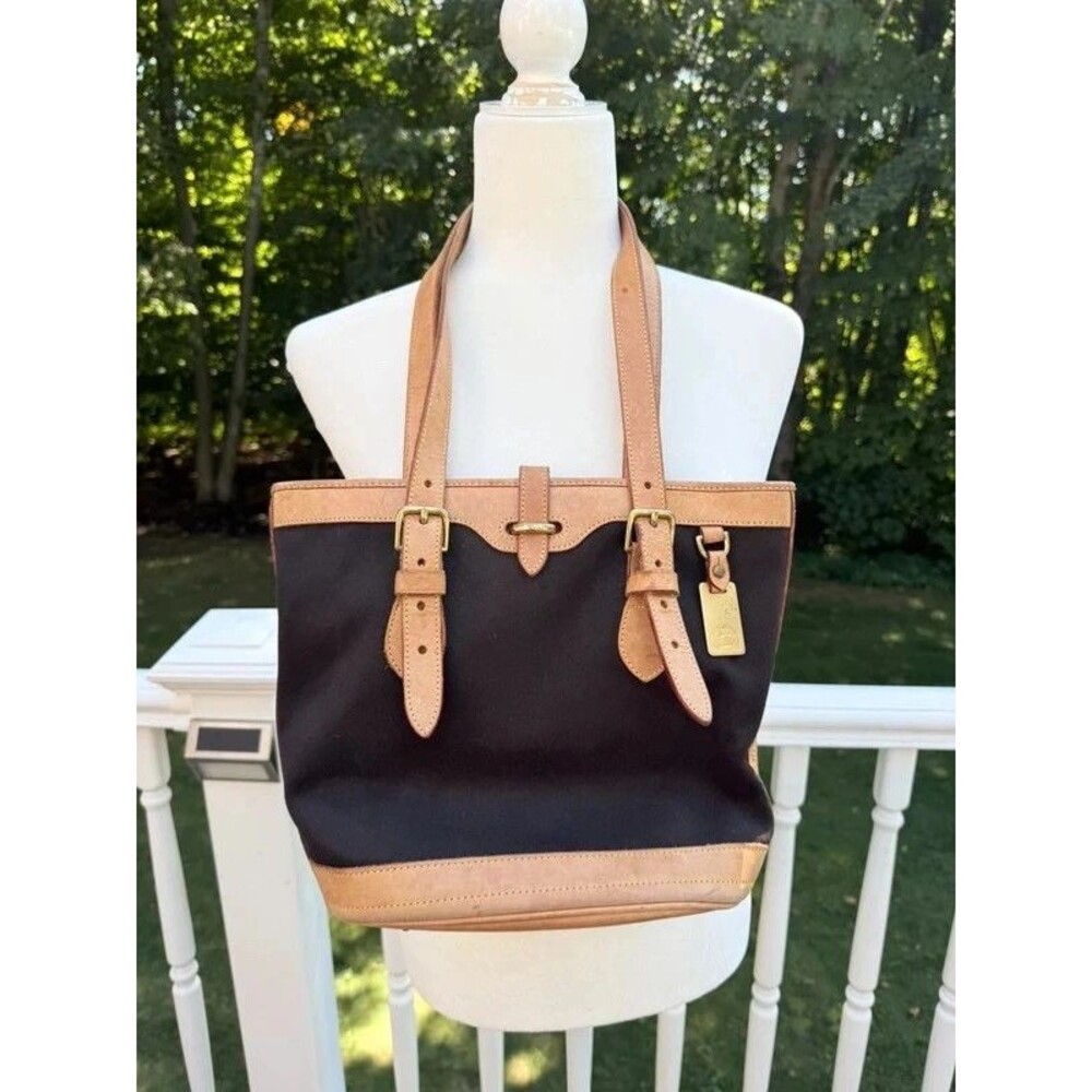 This is a vintage Dooney & Bourke Cabriolet chocolate brown canvas tote